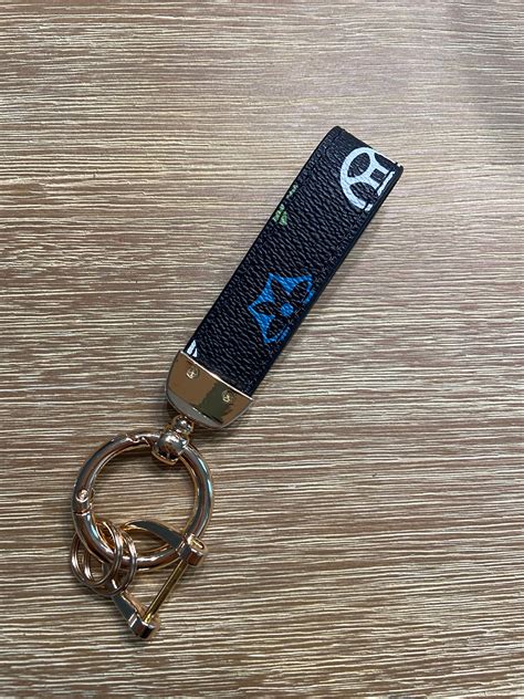 louis vuitton lion keychain|authentic Louis Vuitton keychain.